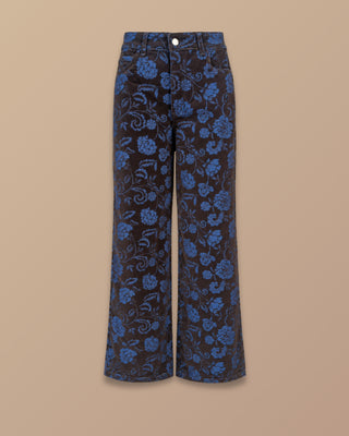 JEAN AZUL BOTA ANCHA CON FLORTES ESTAMPADAS