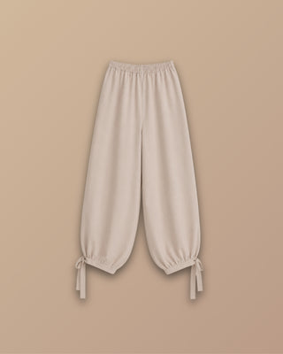 PANTALON BEIGE ALADINO DE AMARRAR BOTA PIEL DURAZNO