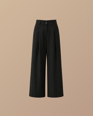 PANTALON NEGRO SENCILLO CON PRENSES Y BOTA ANCHA