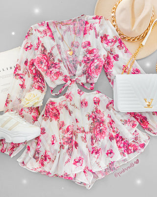 Romper rosado, manga larga, floral y amarrar en la cintura
