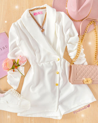 Romper blanco manga puff tres botones dorados