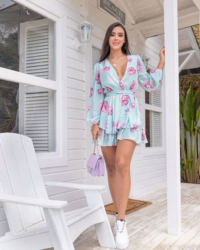 Romper azul floral manga larga con lazo