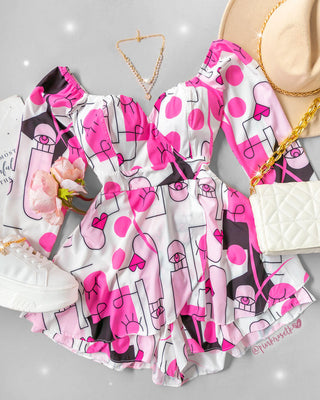Romper rosado manga larga escote V estampado caras