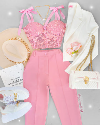 Pantalón rosado con vena y bolsillos