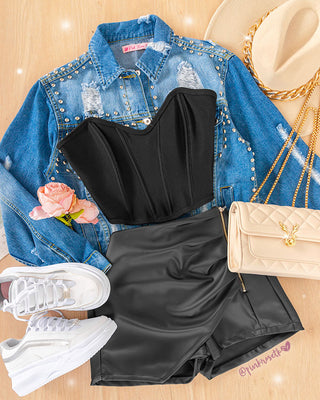 Chaqueta de blue jean con desgastes y taches