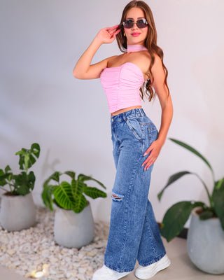 Jean bota ancha con rotura en rodilla