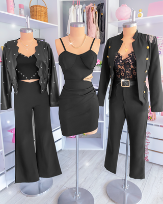 Blazer negro estilo militar con botones dorados y hombreras