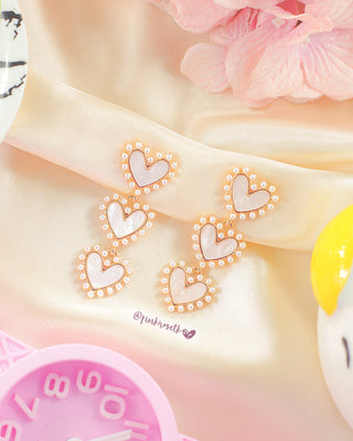 Arete triple de corazón con perlas