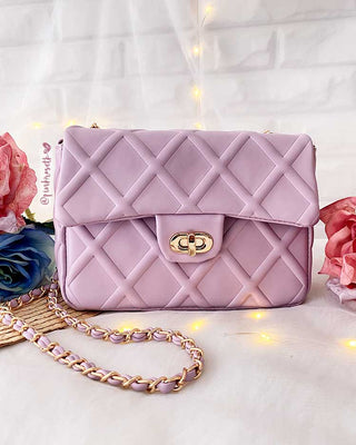 BOLSO LILA EN X