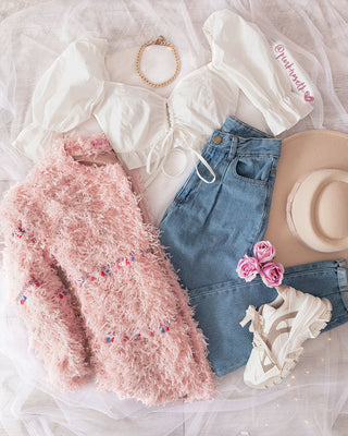 CHAQUETA PELUDA DE BORLAS ROSA