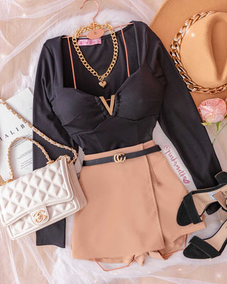 Blusa de varilla dorada