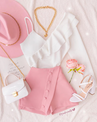 Falda short rosada de botones