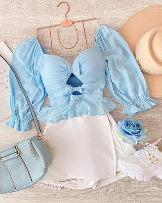 Blusa de moñitos