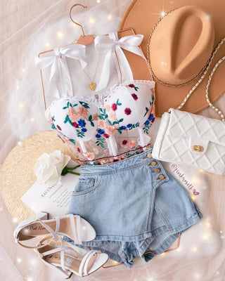 FALDA SHORT DE JEAN CUATRO BOTONES