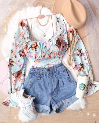 Blusa drapeada estampada